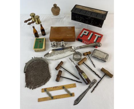 A collection of vintage misc items. To include Housewife's Saving Bank, Bone rule, novelty salt and pepper pots, wooden handl
