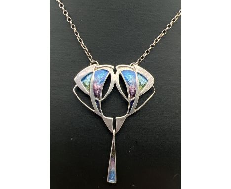 A silver Art Nouveau style fixed pendant necklace. A floral design central pendant with triangular drop and blue, green &amp;