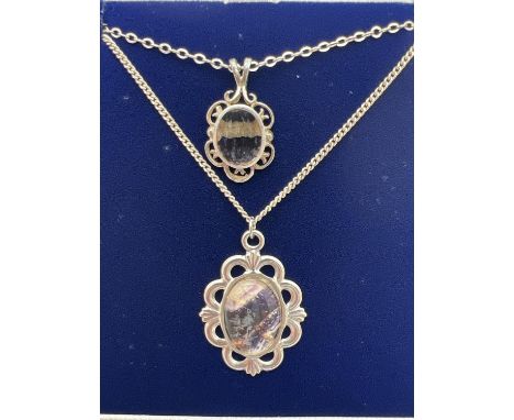 2 vintage blue john pendants on silver chains with spring ring clasps. A 1.6cm pendant on a 17" belcher style chain, together