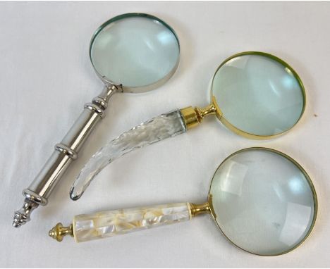 3 large magnifying glasses to include faceted glass, handle set with pearl panels and silver tone with turned design. Glass d