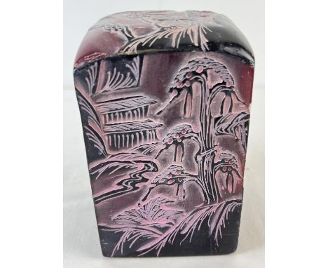 A large &amp; heavy Chinese soapstone seal with carved scenes to each side. Approx. 16.5cm tall and weighs approx. 4.25kg. 