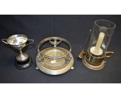 A silver two handled trophy, London 1906; a 19th century silver plated neo-classical bottle coaster; a night light (3)