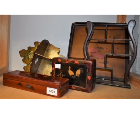 Two Japanese lacquer boxes; tray; netsuke stand; folding wall bracket