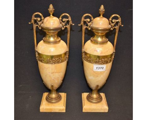 A pair of French Louis XVI Revival gilt-metal mounted marble twin-handled mantel urns, the vasular balusters inset with a pan