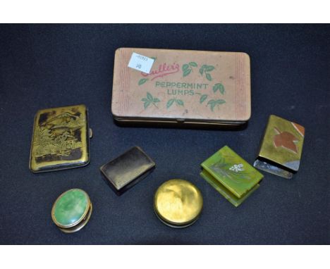 A Japanese cigarette case; a French stamp box; three snuff boxes; Trench Art matchbox case