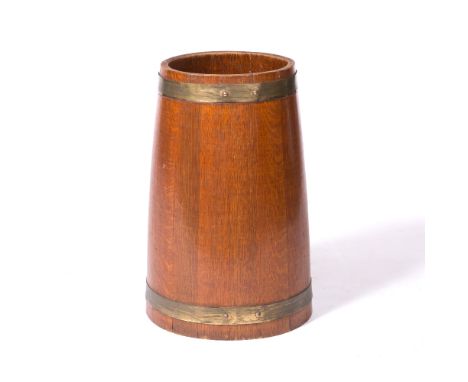 R.A. Lister & Co Ltd of Dursley Oak stick stand, circa 1910 with brass bindings ivorine makers label 49cm high.