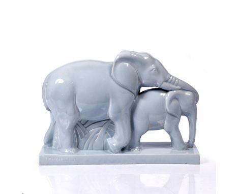 Charles Lemanceau Art Deco model of two elephants, circa 1930 in light blue impressed signature 35cm high.