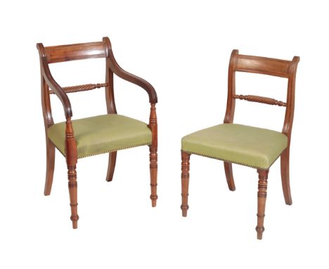 A SET OF EIGHT REGENCY MAHOGANY DINING CHAIRS, c.1815, including two elbow chairs, all with panel top rails and twist turned 