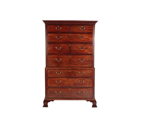 A GEORGE III MAHOGANY SECRETAIRE CHEST ON CHEST, circa 1775, the cornice with Greek key and ovolo mouldings, the upper sectio