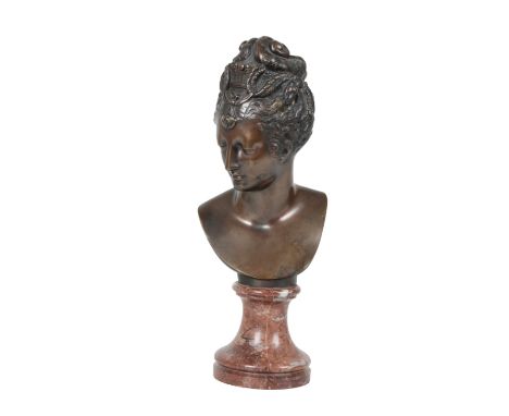 AFTER JEAN-ANTOINE HOUDON, (FRENCH, 1741 â€“ 1828), A BRONZE BUST OF A MAIDEN, portrayed with head declined a little to dexte