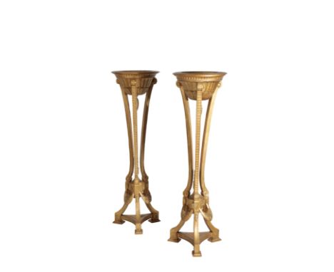 A PAIR OF CARVED AND GOLD PAINTED WOOD JARDINIERE STANDS IN NEOCLASSICAL TASTE, 20th century, each with a fluted and lanceola