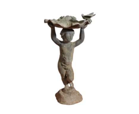 A LEAD FIGURAL GARDEN FOUNTAIN, early 20th century, the standing putto holding a scallopshell basin above his head, a bird pe