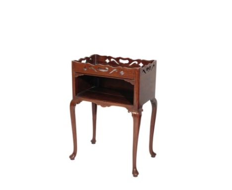 A LATE GEORGE II OR GEORGE III MAHOGANY TRAY TOP COMMODE, circa 1760 and later adapted, the pierced gallery with a handle to 