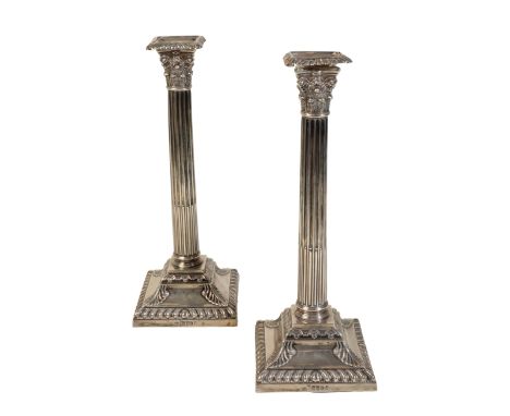 PAIR OF CORINTHIAN COLUMN SILVER CANDLESTICKS, by Henry Wilkinson and co, London, 1871, with removable sconce on a square ste