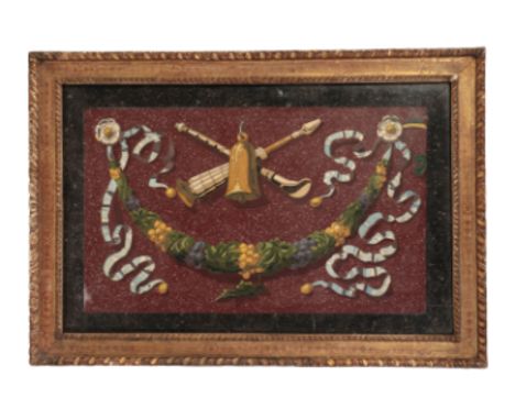 AN ITALIAN PIETRE DURE INSET SCAGLIOLA PANEL, of rectangular form, with a musical trophy above a beribboned foliate festoon, 