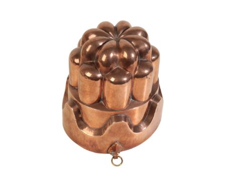 A LARGE VICTORIAN CASTELLATED COPPER 'JELLY' MOULD, circa 1890, stamped/struck twice, with hanging ring, height: 20cm. Proven