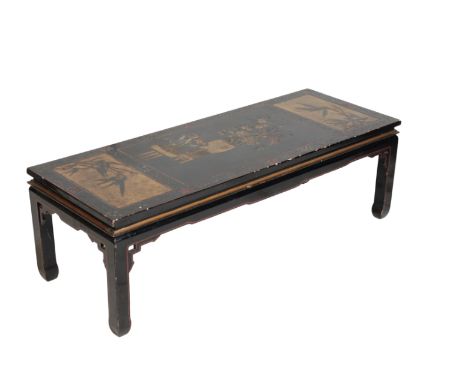 CHINESE BLACK LACQUER LOW TABLE, QING DYNASTY AND LATER the rectangular Chinoiserie decorated panel top, raised on an associa