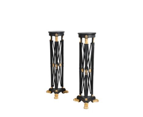 A PAIR OF PAINTED WOOD AND COMPOSITION TORCHERE STANDS, IN NEOCLASSICAL STYLE, late 19th century and later redecorated, in th