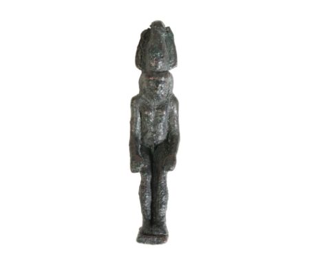 AN EGYPTIAN BRONZE AMULET CAST AS OSIRIS, probably Late Period, 712 - 323 B.C., cast AS seated and portrayed wearing the Atef