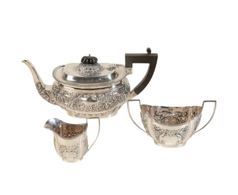 A MATCHED VICTORIAN THREE PART SILVER TEA SET the matching cream jug and sucrier by George Nathan and Ridley Hayes, Chester, 