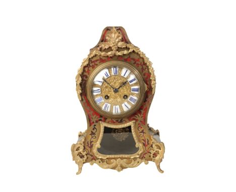 FRENCH BOULE AND EBONISED MANTEL CLOCK of cartouche shape, with gilt repousse dial, blue Roman numerals and white enamel tabl