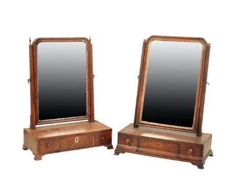 TWO LATE GEORGE I OR GEORGE II DRESSING TABLE MIRRORS, second quarter 18th century, of typical form, one of walnut, the other