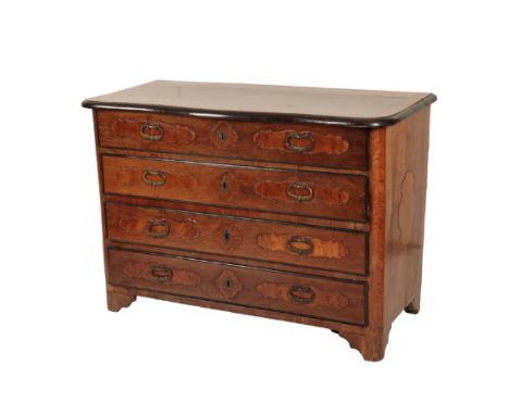 A CONTINENTAL WALNUT AND CROSSBANDED CHEST OF DRAWERS, probably Austro-German, mid 18th century, the top with ebonised ovolo 