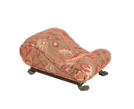 A REGENCY ROSEWOOD AND GILT BRONZE MOUNTED GOUT STOOL, circa 1815, the later upholstered top of serpentine form, on a rectang