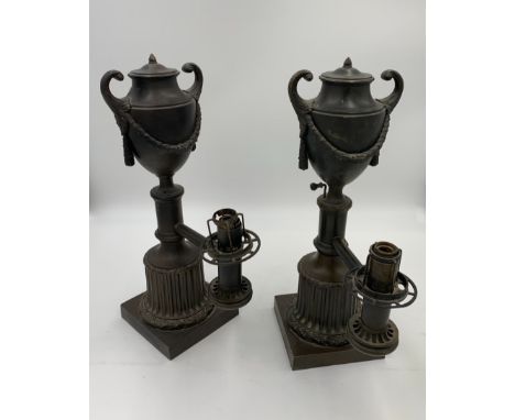 A PAIR OF GEORGE IV PATINATED BRONZE COLZA TABLE LAMPS, circa 1820, each with a swagged urn reservoir on a cylindrical shaft,