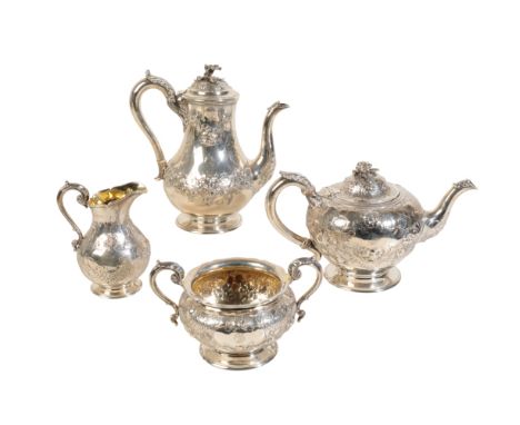 A VICTORIAN FOUR PIECE SILVER TEA SET by Hunt and Roskell, Late Storr and Mortimer, comprising coffee/hot water pot, teapot, 