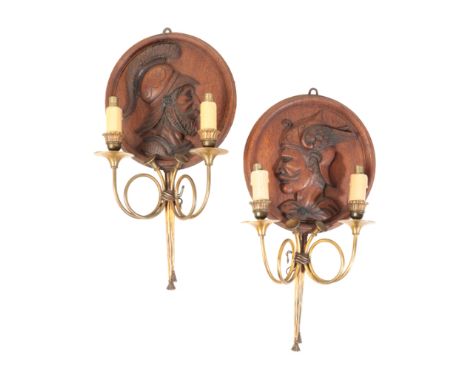 A PAIR OF WALNUT AND GILT METAL MOUNTED TWIN LIGHT WALL APPLIQUES, the sconces, arms and backplates modelled in each applique