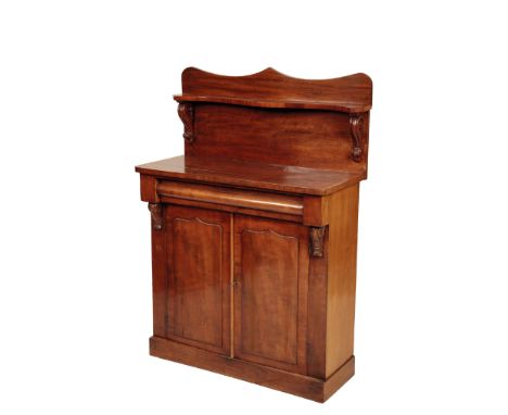 A VICTORIAN MAHOGANY CHIFFONIER, Circa 1875, the gallery with serpentine top and shelf, above a projecting and cushion moulde