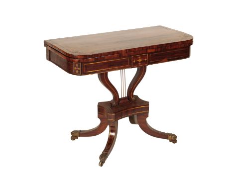 A GEORGE IV GONCALO ALVES AND BRASS STRUNG CARD TABLE, circa 1825, the hinged top with rounded front corners, above a lyre fo