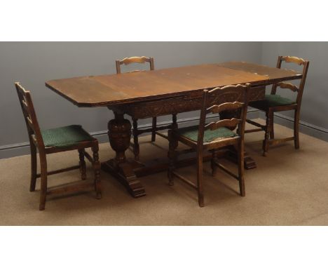 Early 20th century oak drawer leaf dining table, turned and carved rails and columns on sledge supports joined by single stre