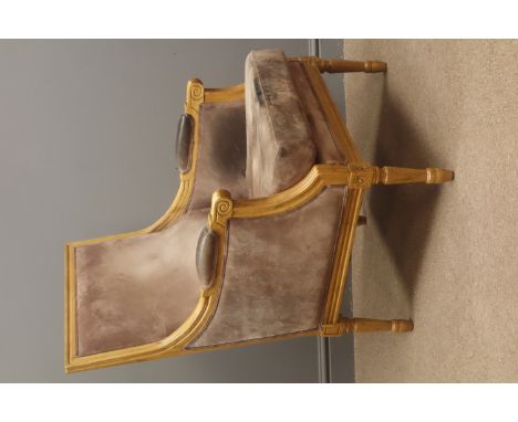 French style light oak framed armchair, upholstered back, seat and arms, turned and reeded supports, with loose cushion, W70c