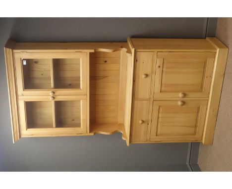 Solid pine dresser, projecting cornice, two glazed cupboards doors enclosing two shelf, above two drawers and two cupboard do