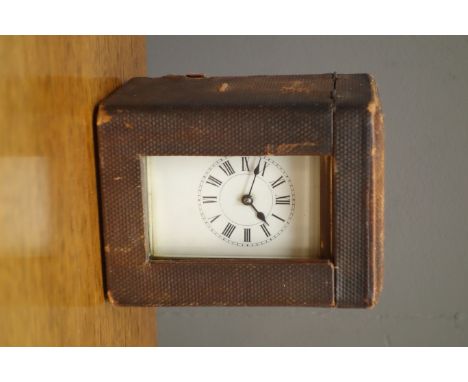 Early 20th century French brass carriage clock, with key and case, H14.5cm (including handle)
