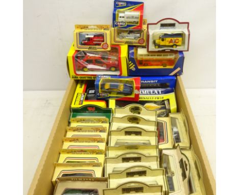 Thirty-two boxed diecast model vehicles including; Lledo 'Days Gone', Corgi, Bburago 1/25 scale model of an Audi Quattro GT, 