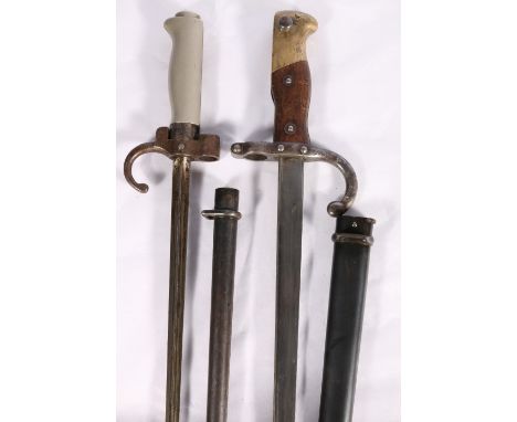 French model 74 epee bayonet St Etienne April 1878 with scabbard (non matching numbers) and a French model 86 epee bayonet wi