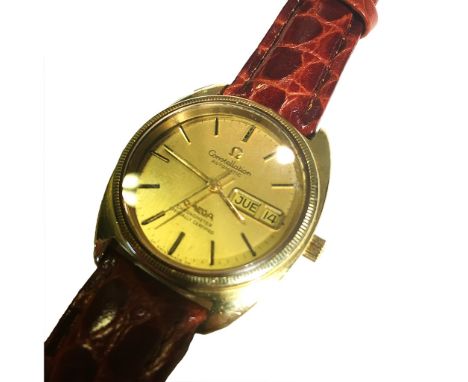 OMEGA Circa 1970 Constellation automatic A gold 18 k wristwatch , case screw down , Movement self winding , dial sunburst cha