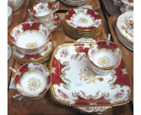 Tray of late 19th/early 20th Century Coalport teaware, painted marks to base, no.: 2665, on a white ground with gilt and burg