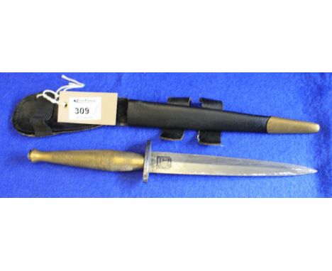 Copy of a Sykes Fairbairn Second Pattern Commando fighting knife, having engine turned brass hilt and blade marked: 'The FS F