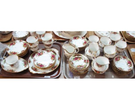Two trays of Royal Albert 'Old Country Roses' bone china teaware items to include: teacups and saucers; side plates; milk jug