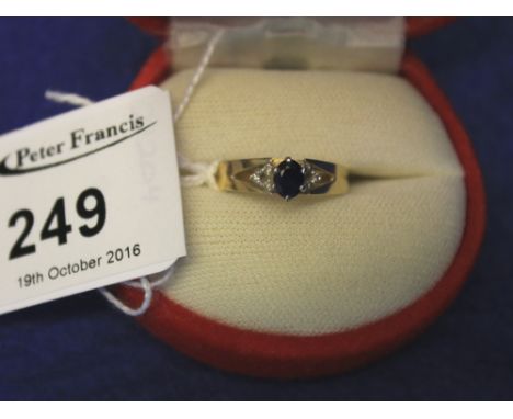 15ct gold sapphire and diamond dress ring.  Boxed.