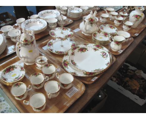 Four trays of Royal Albert 'Old Country Roses' teaware items to include: teacups and saucers; teapots; oval meat dishes etc. 