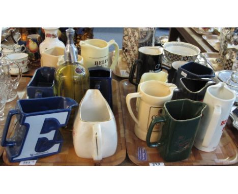 Two trays of assorted advertising water jugs to include: Worthington E; Buckley 1977; Carling Black Label; Bell's Old Scotch 