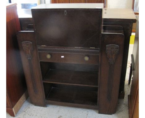 Stained oak Art Deco design writing bureau with fitted shelves.