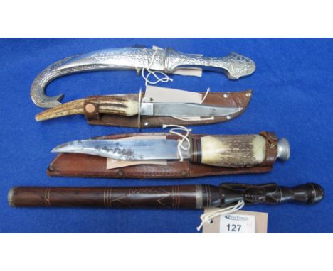 Group of four sheath knives to include: Sheffield horn handled knife with leather scabbard; another similar, smaller; a white