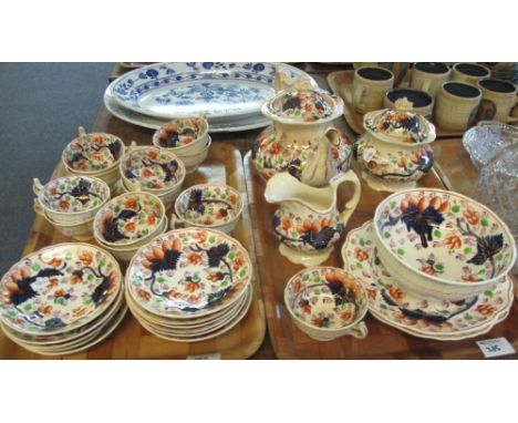 Two trays of 19th Century Gaudy Welsh Imari design teaware to include: cups and saucers; teapot; two handled lidded sucrier; 