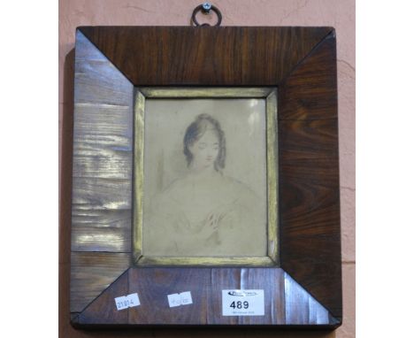 Victorian School, portrait of a pensive young woman, watercolours, original rosewood frame with gilt slip.